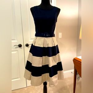 Banana Republic sleeveless, belted dress with bold navy stripes.